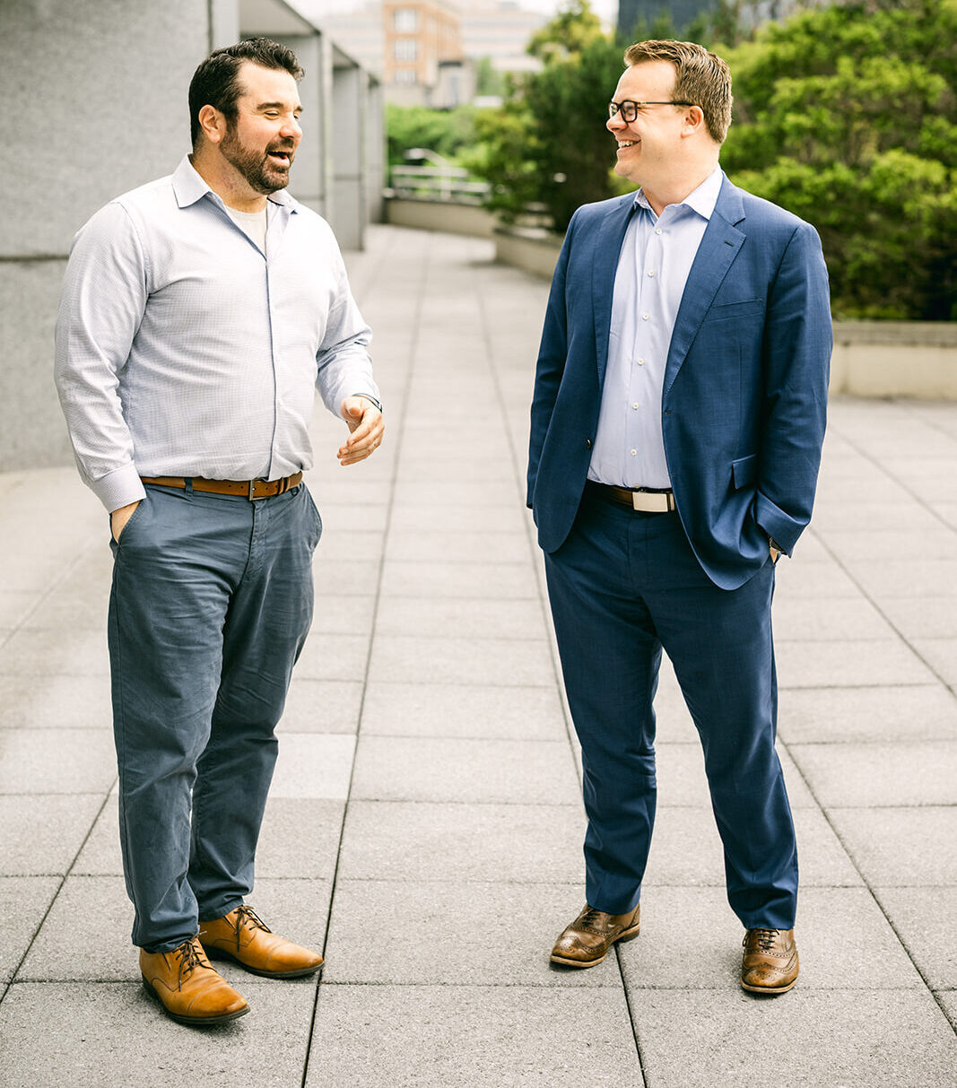 Two professional men in consult conversation at Charles IT Stamford Office - Jay Santos - Foster Charles