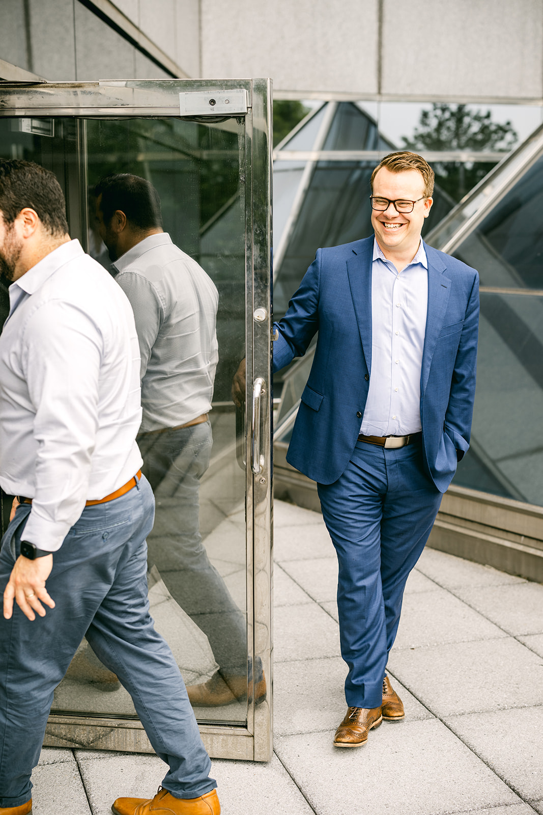 Charles IT team members walking together outside an office building