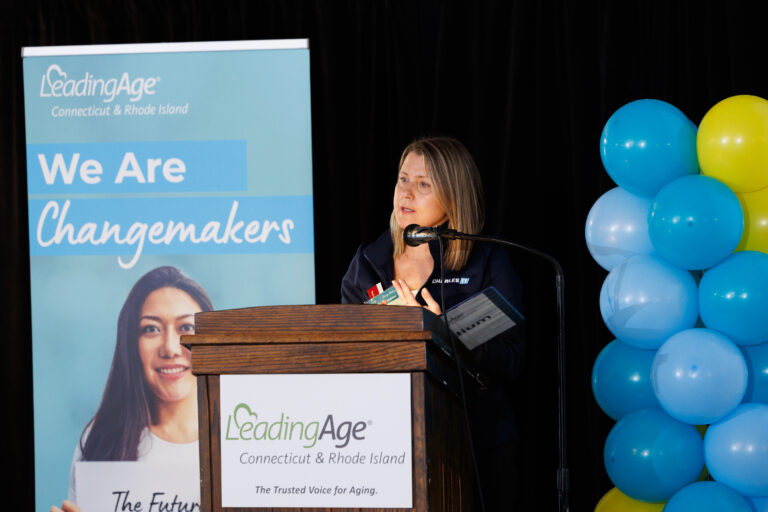 Charles IT representative speaking with senior living professionals at the LeadingAge Connecticut and Rhode Island expo