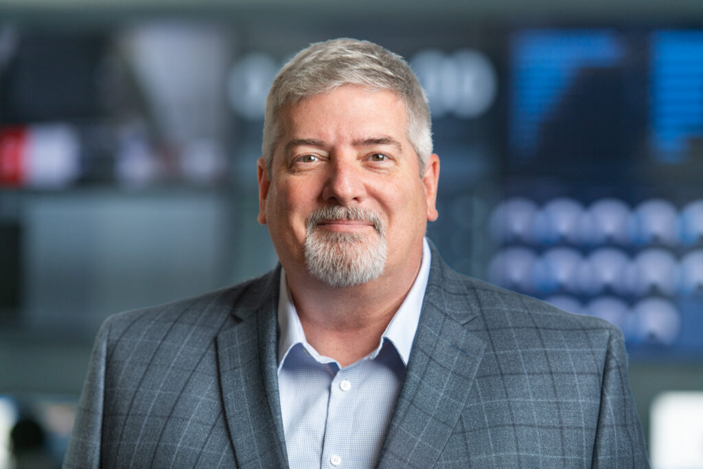 Professional headshot of Larry Robertson, speaker for Charles IT's Virginia Lunch & Learn on the CMMC pause and cybersecurity compliance