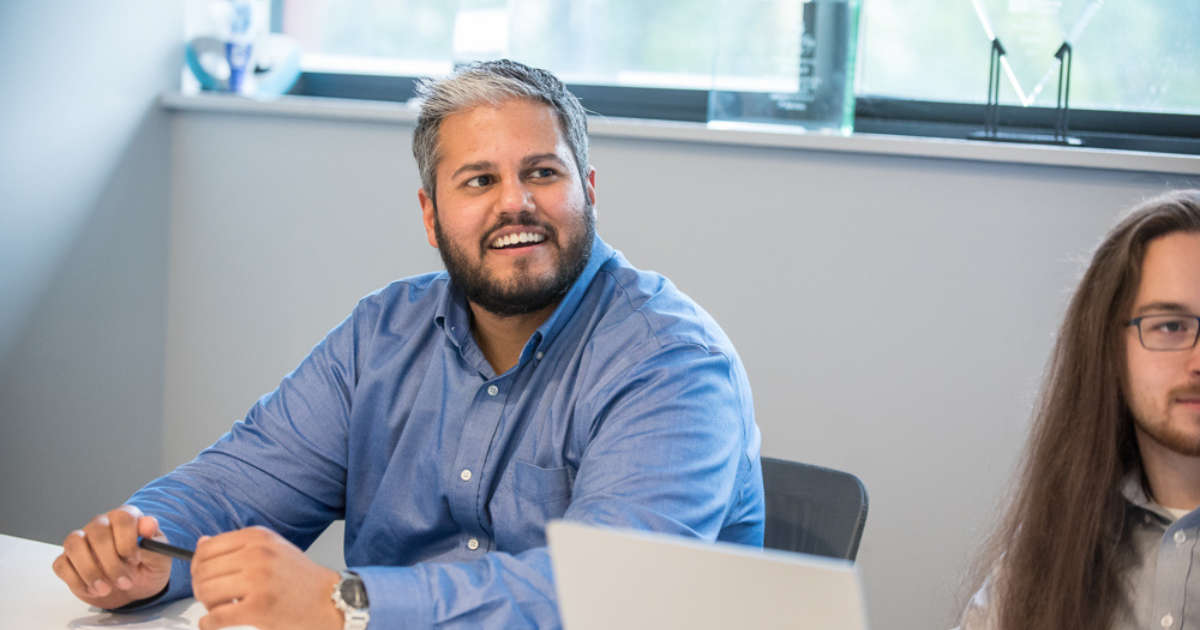 Charles IT team member supporting SIEM security monitoring and log management