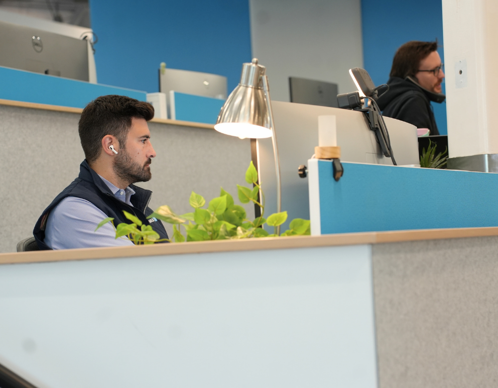 Charles IT professional providing business IT support from a workstation