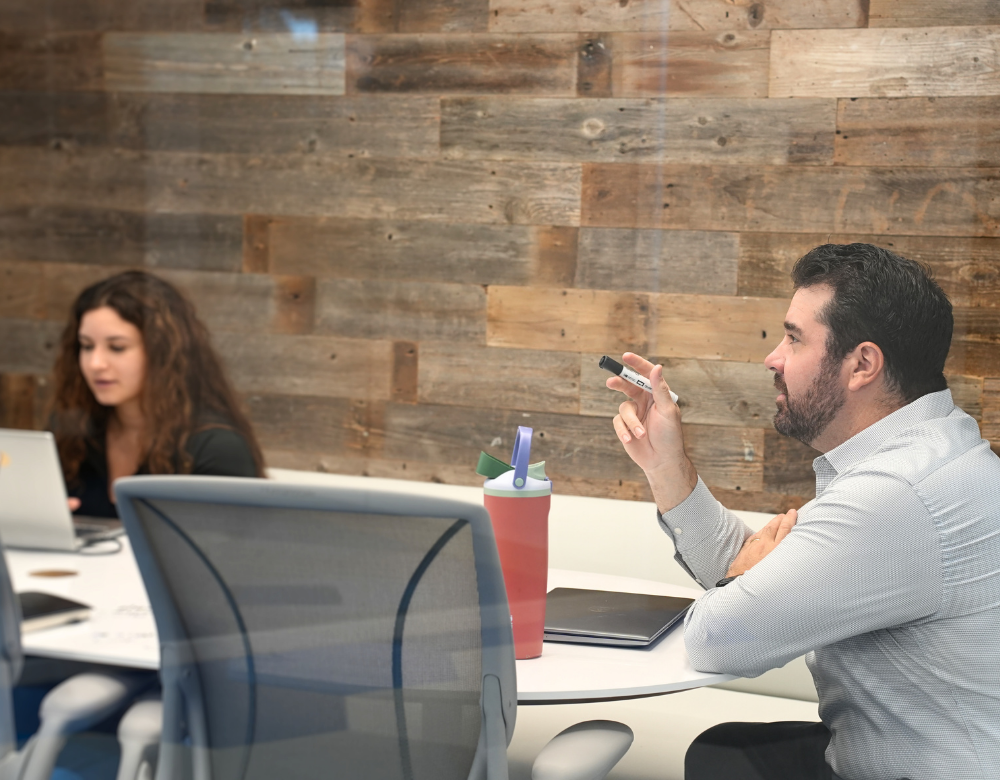 Charles IT team collaborating during an IT strategy meeting