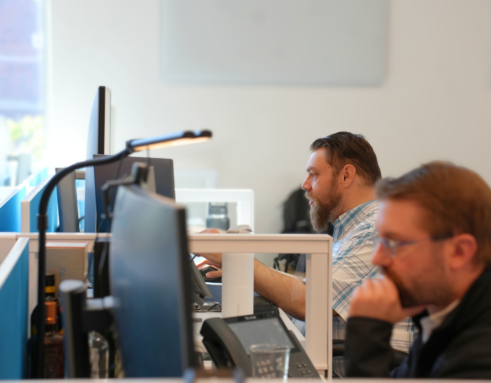 Charles IT security professionals working at technology monitoring stations