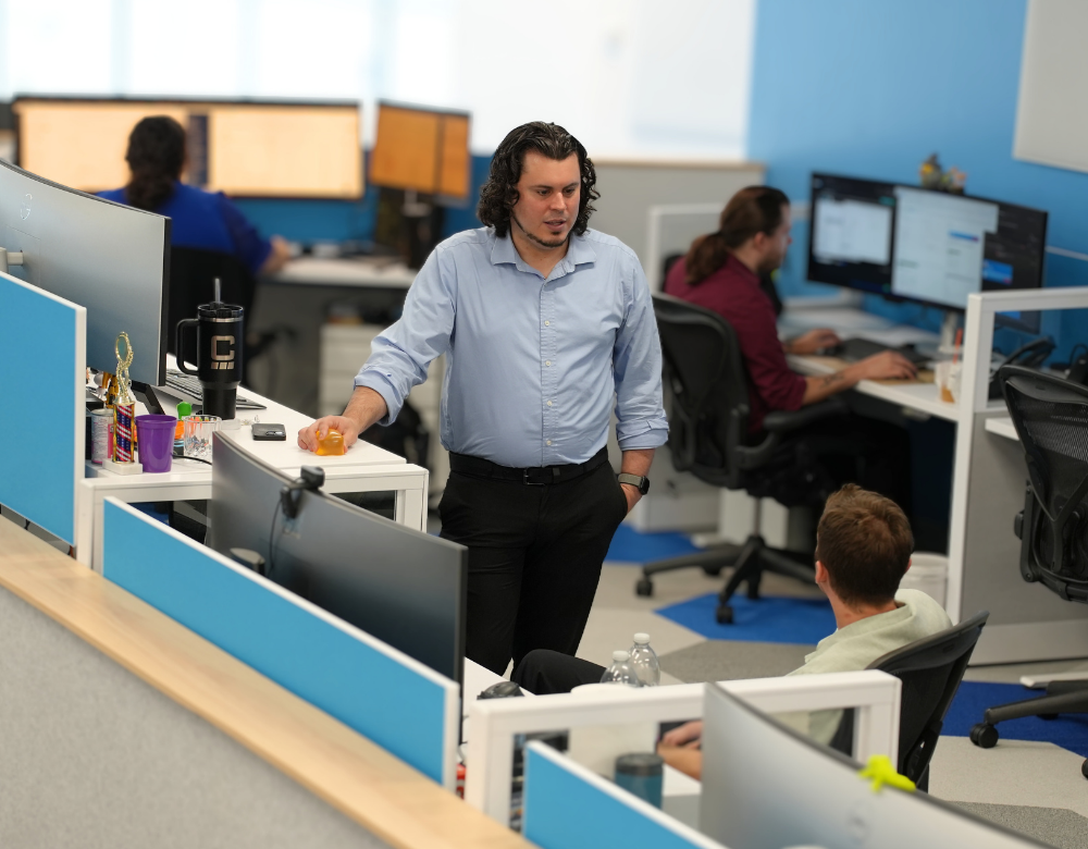 Charles IT managed services team collaborating on client technology